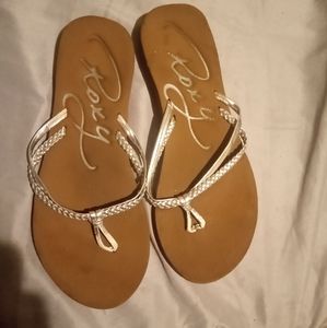 Roxy flipflops, size 7, color is brown with silver